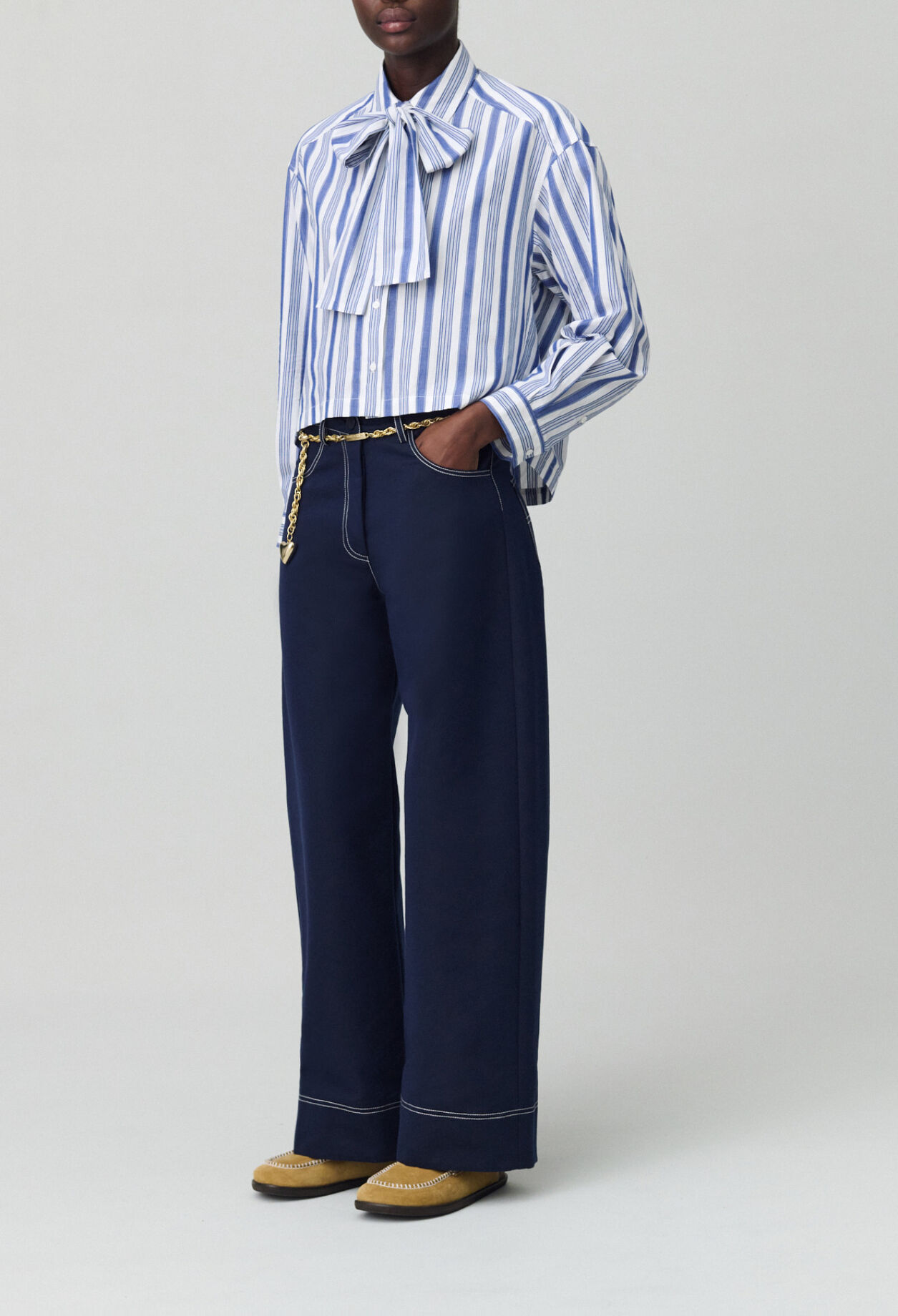 Striped shirt with bow collar