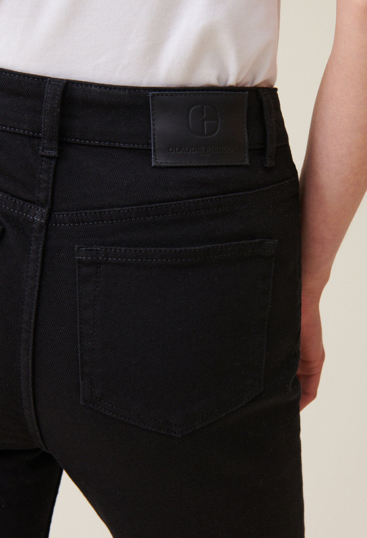 Black mid-rise slim jeans