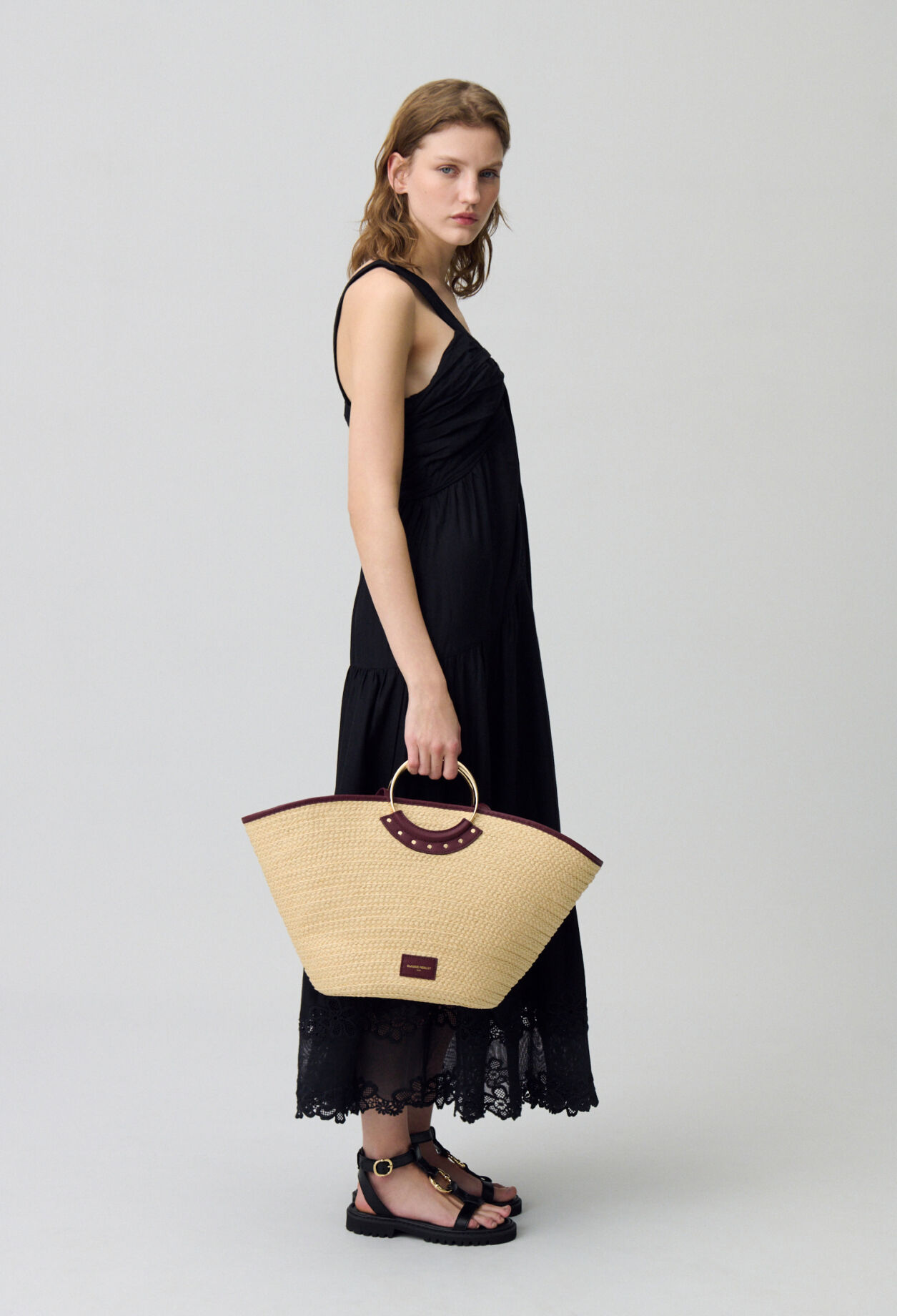 Braided raffia basket with handles