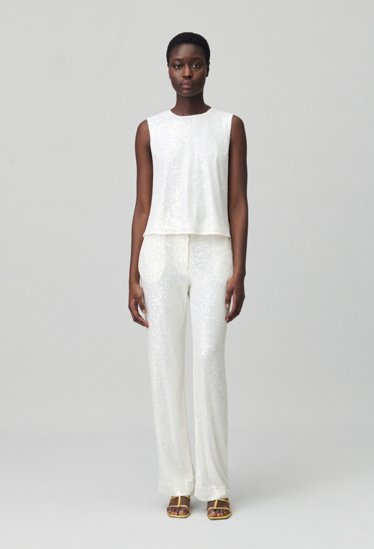 White sequinned trousers