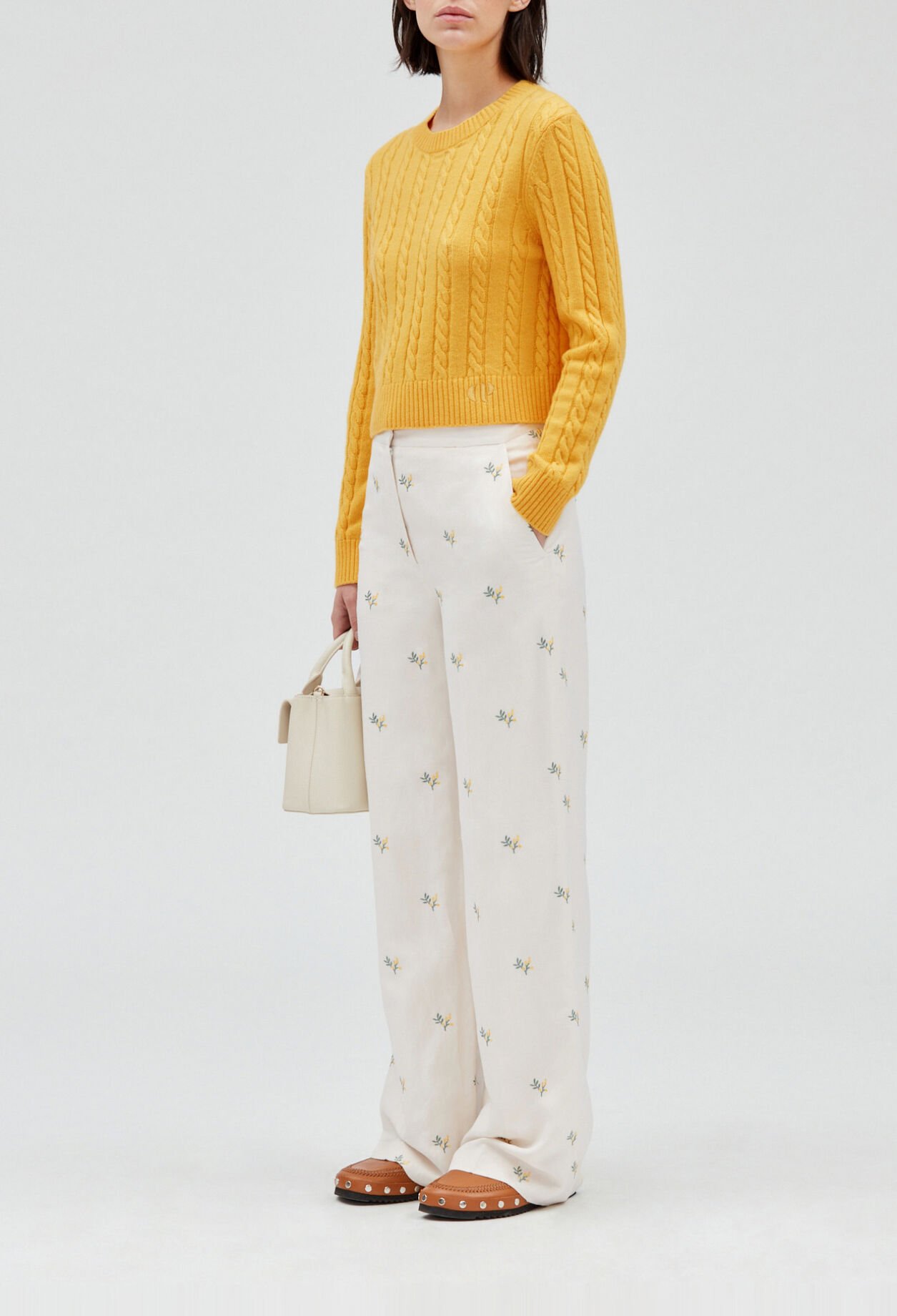 Trousers with embroidered mimosa pattern