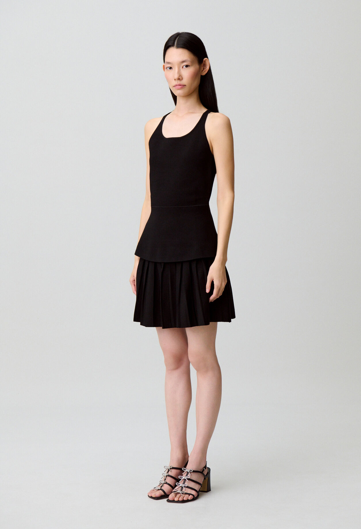 Knit dress with criss-cross straps