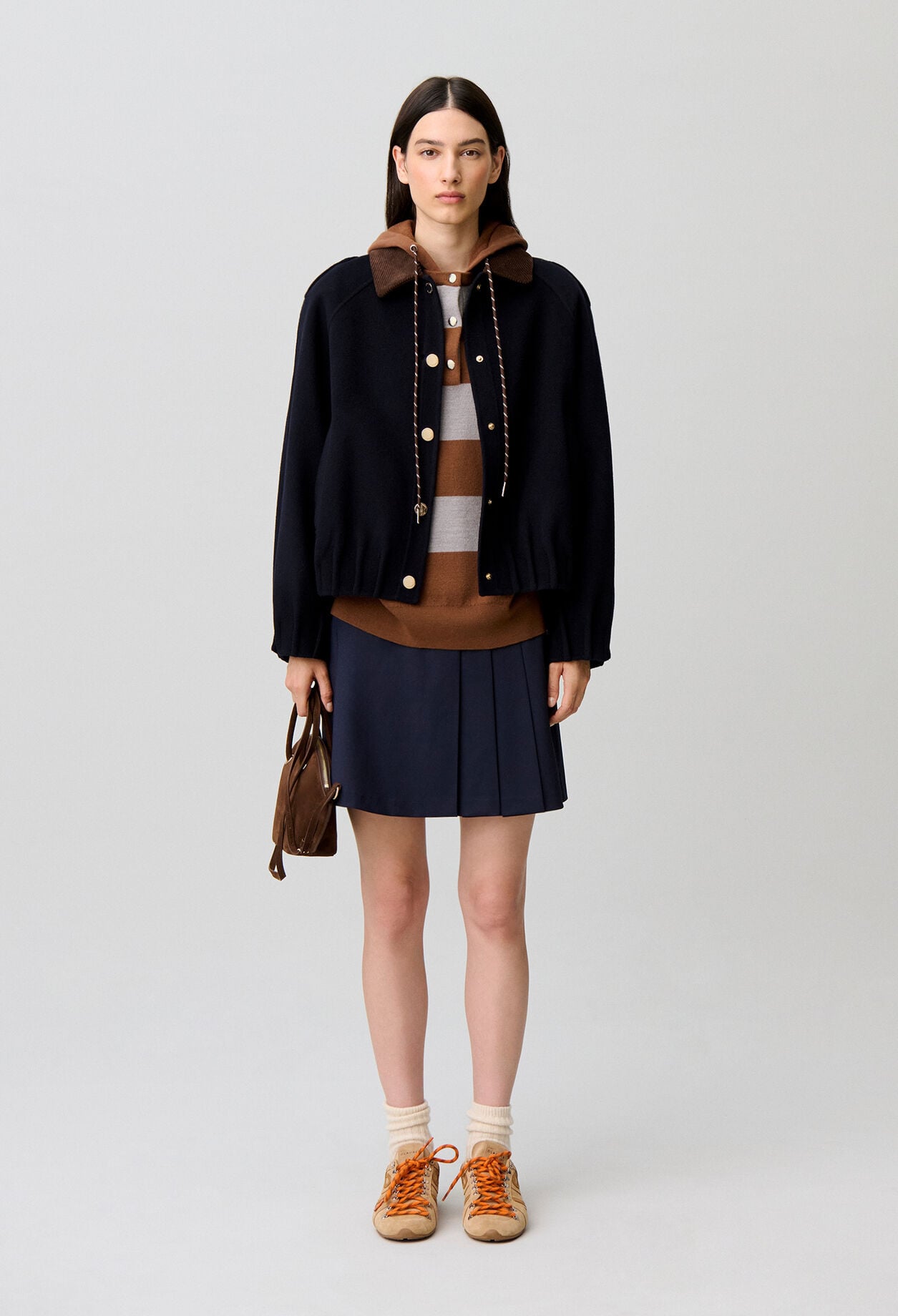 Oversized jacket with gold poppers