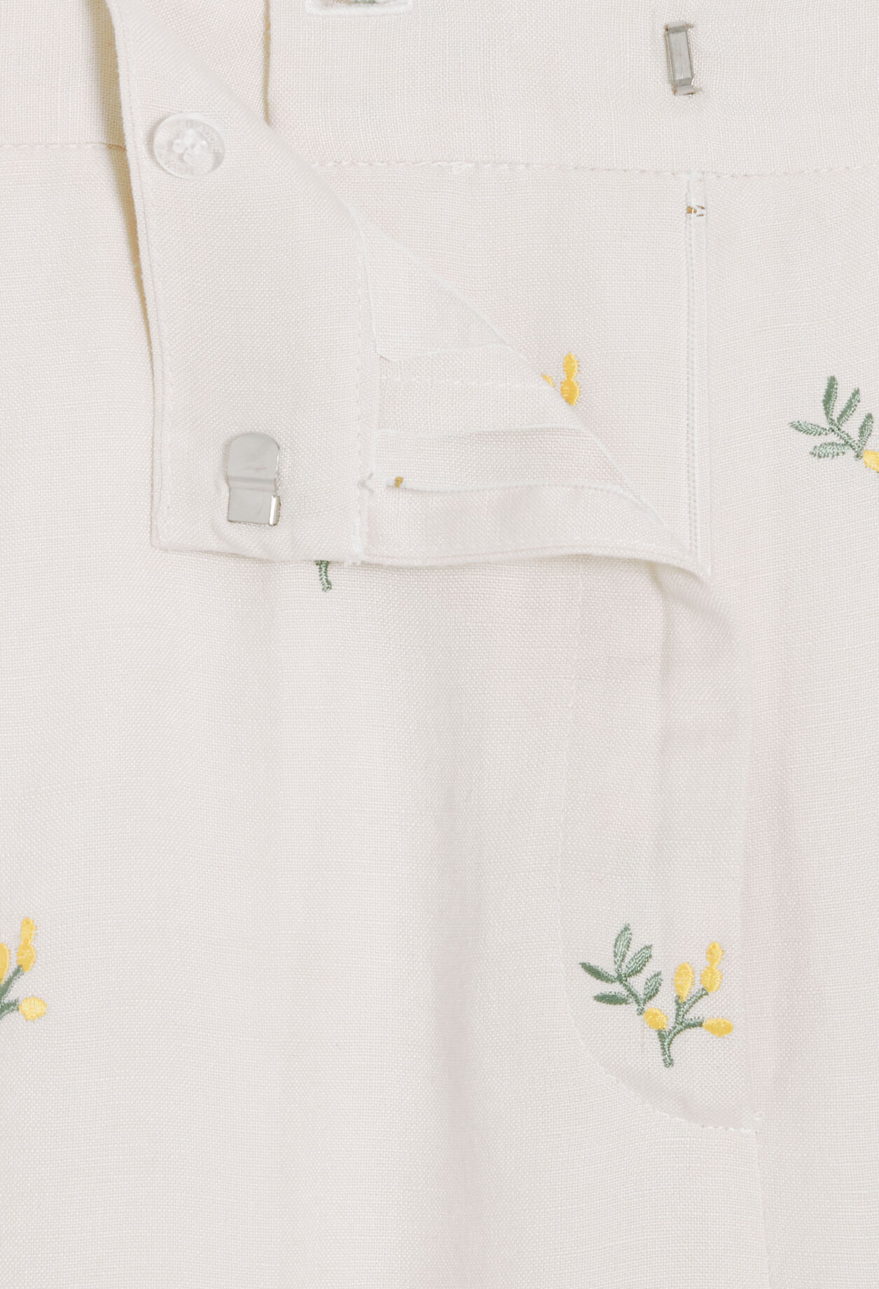 Trousers with embroidered mimosa pattern