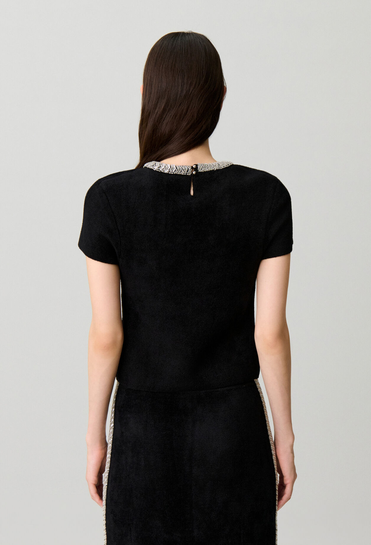Short velvet-effect knit top