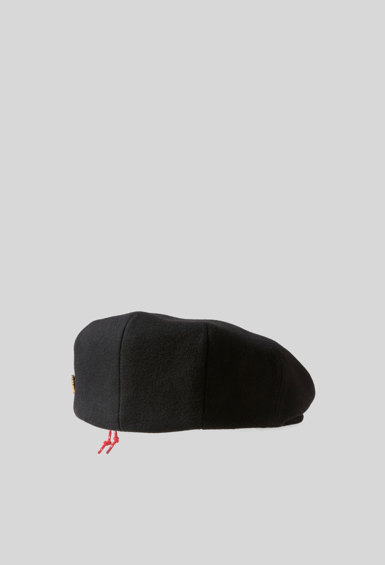 Wool beret with metal brooch