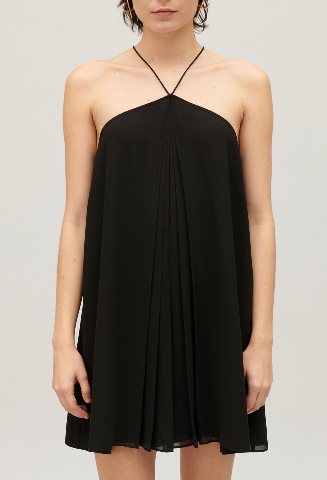 Short black pleated dress