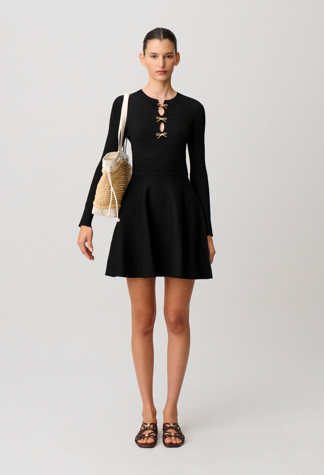 Short knitted dress with knots