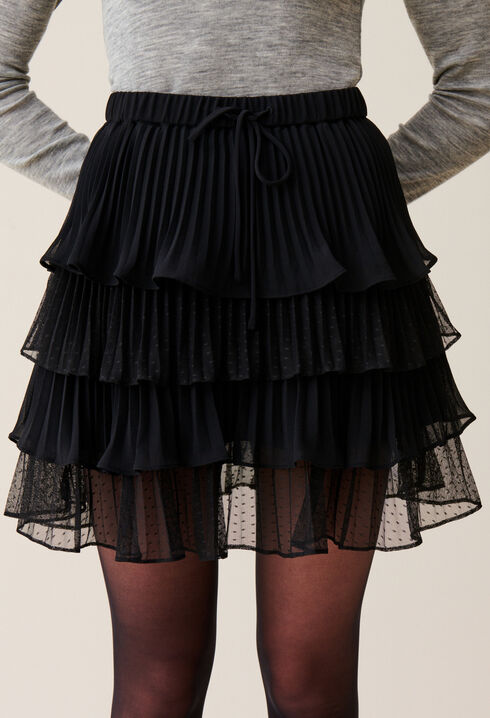 Black short ruffled skirt