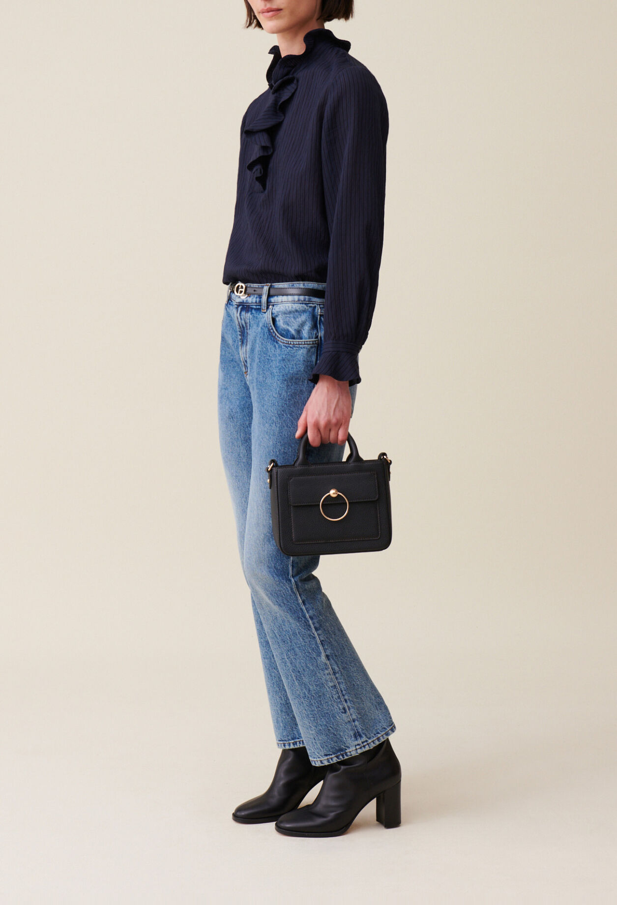Dark blue striped ruffled blouse
