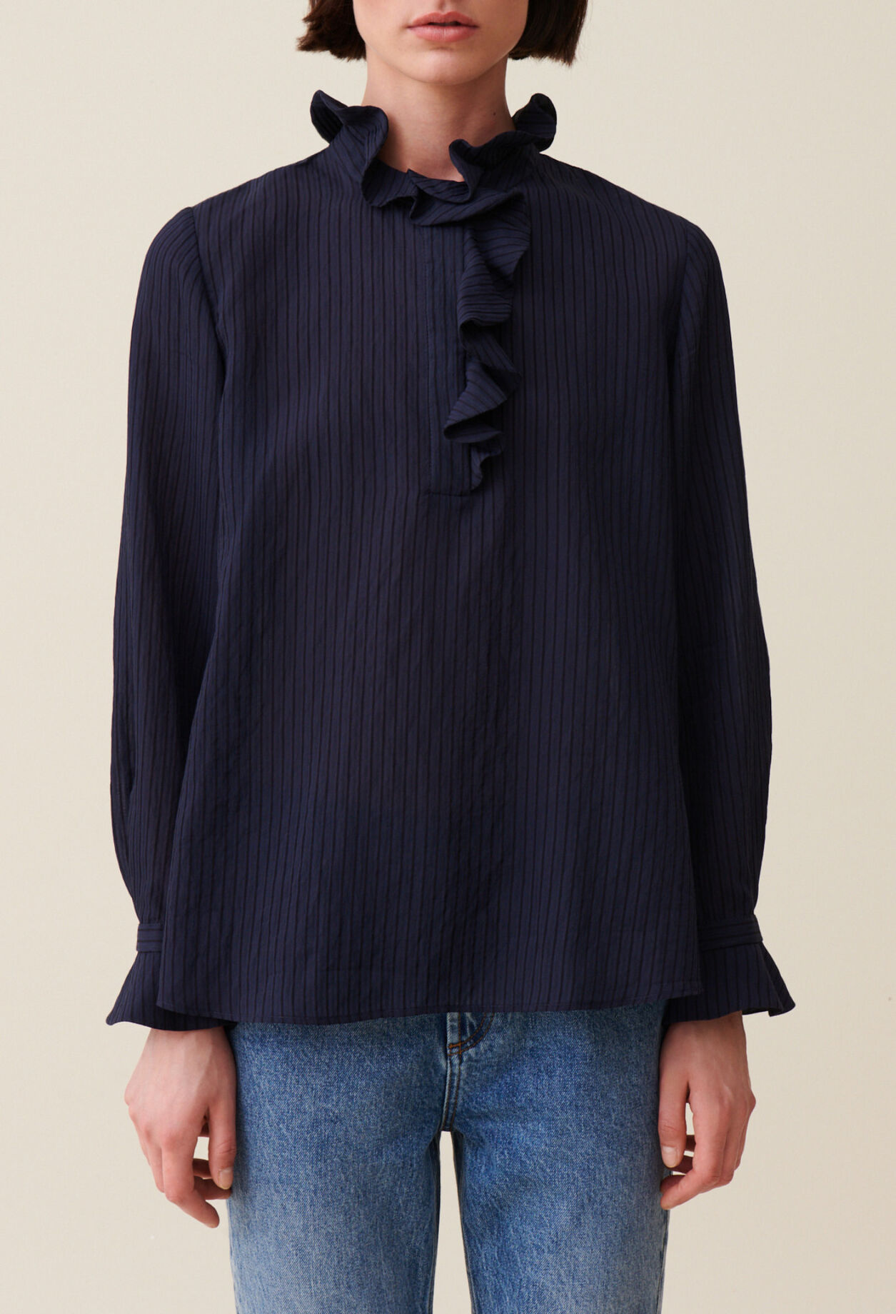 Dark blue striped ruffled blouse