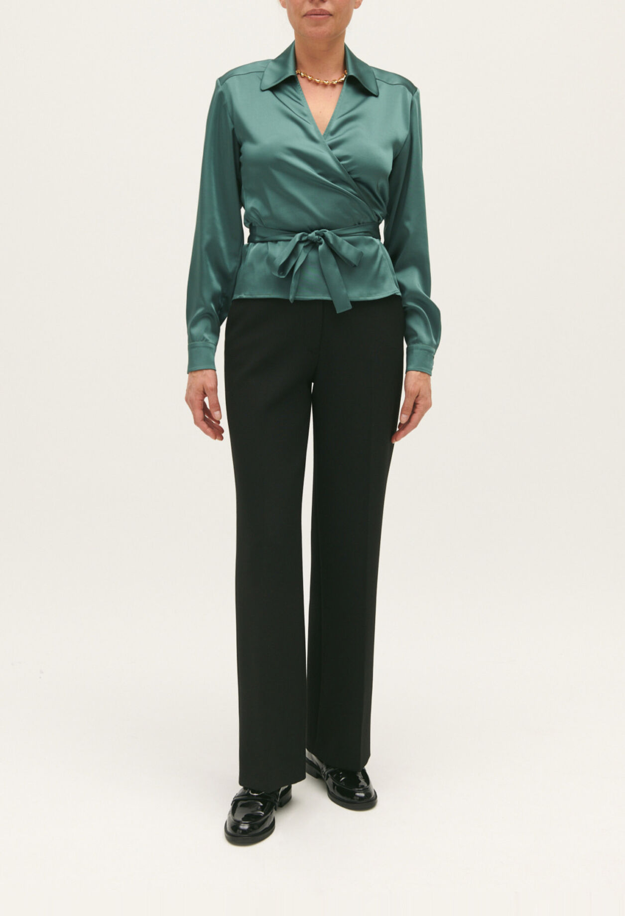Green wrapover blouse