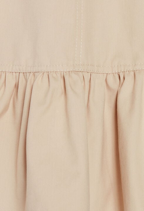 Short beige dress with ruffled sleeves