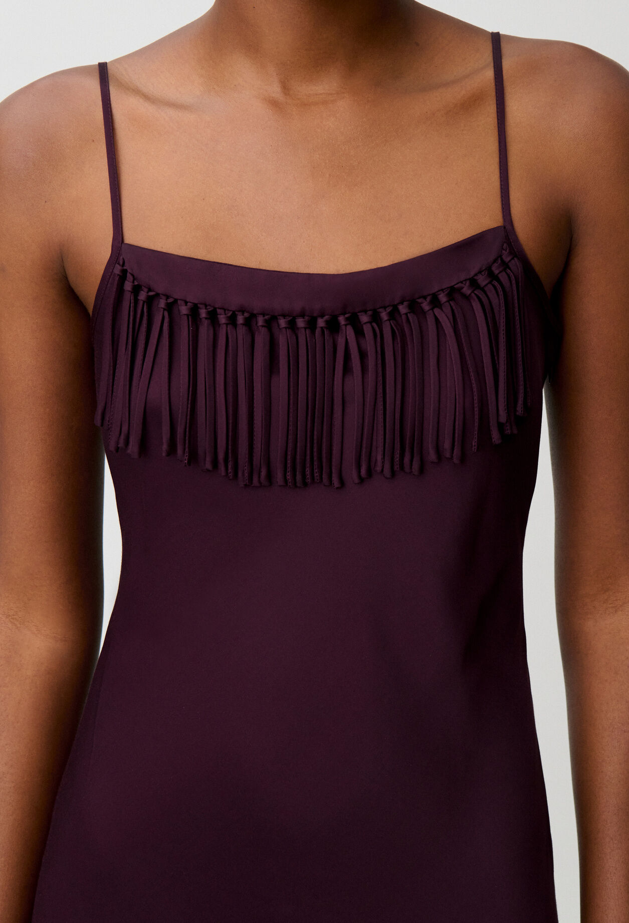 Flowy fringed satin dress
