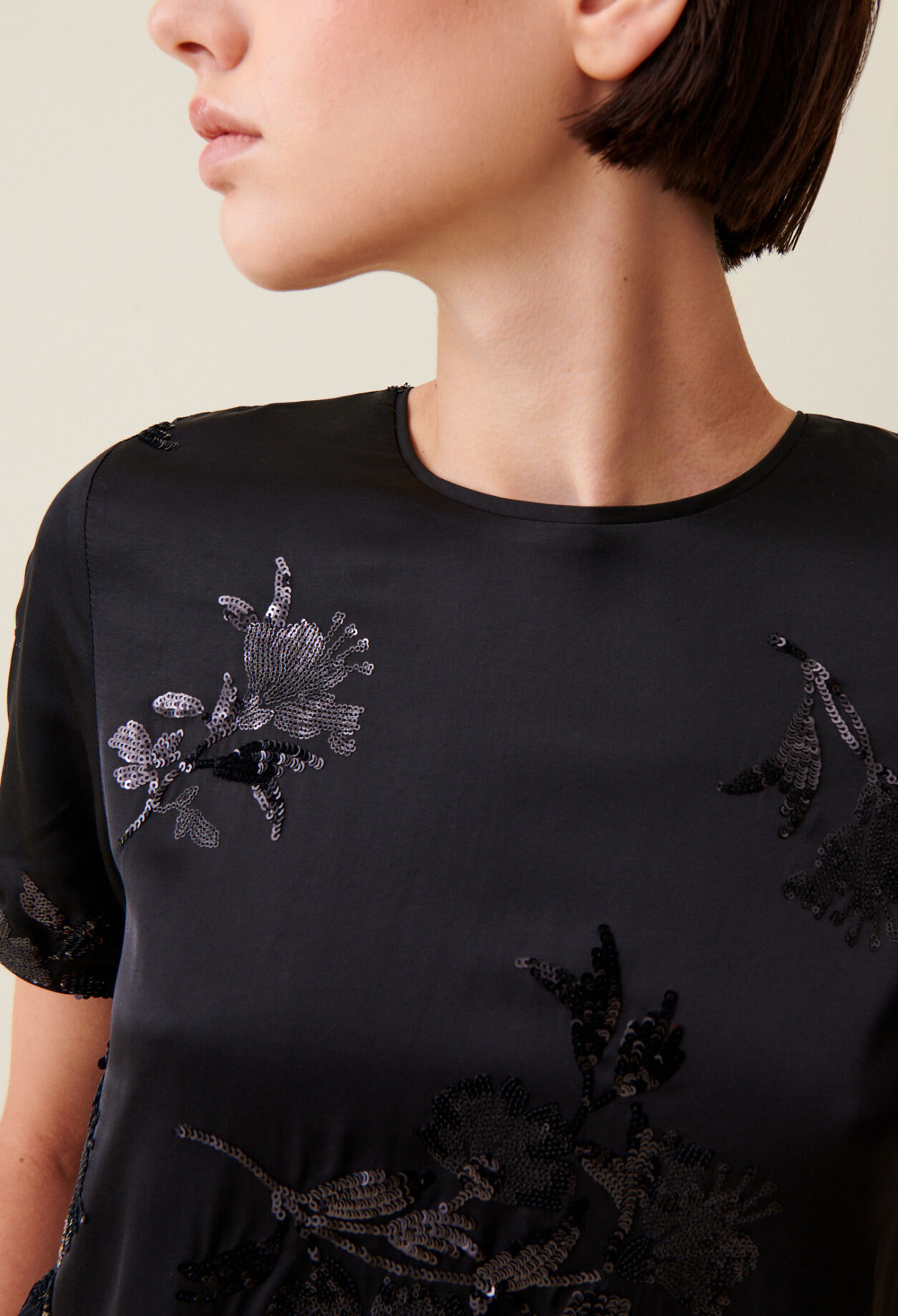 Black top with embroidered sequins