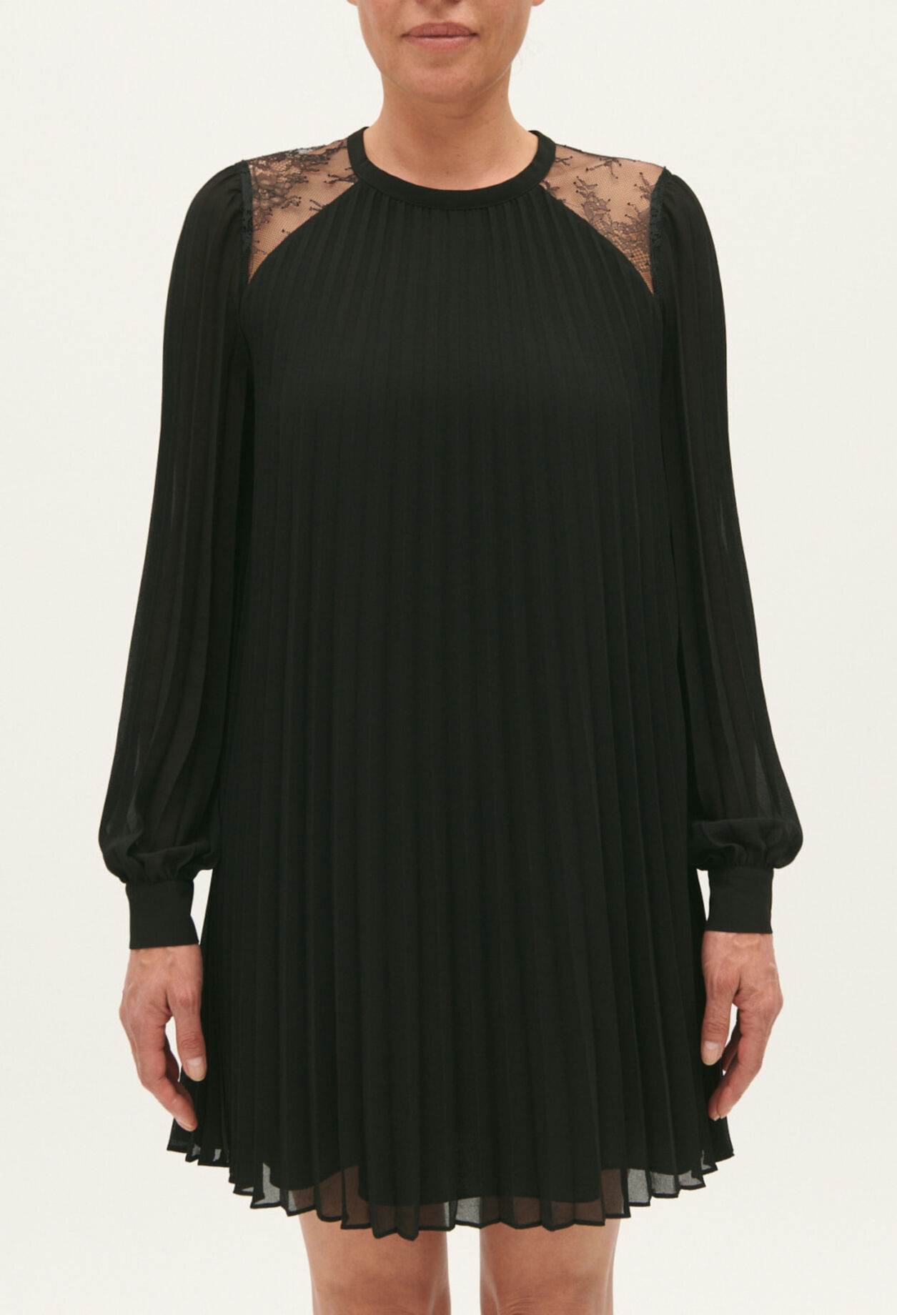 Short black pleated dress