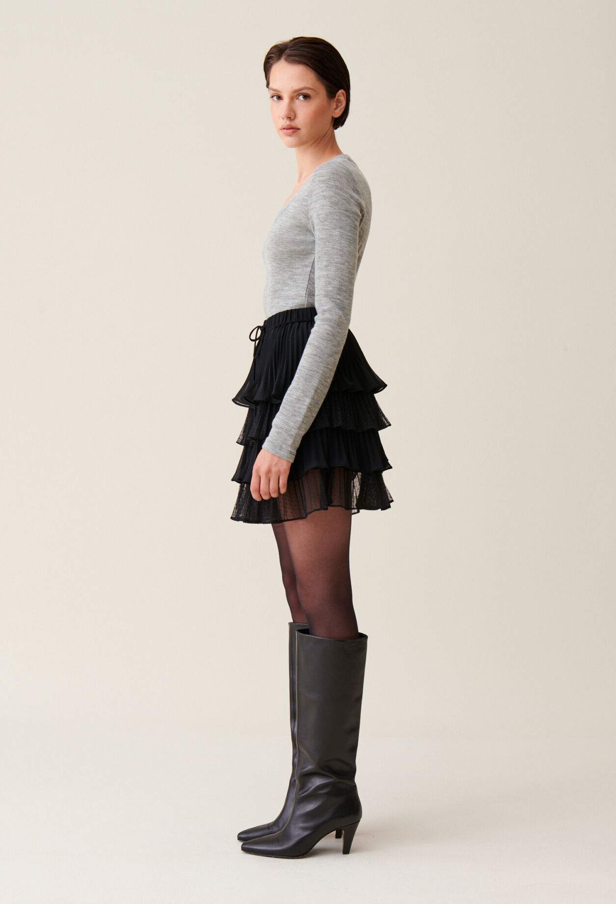 Black short ruffled skirt
