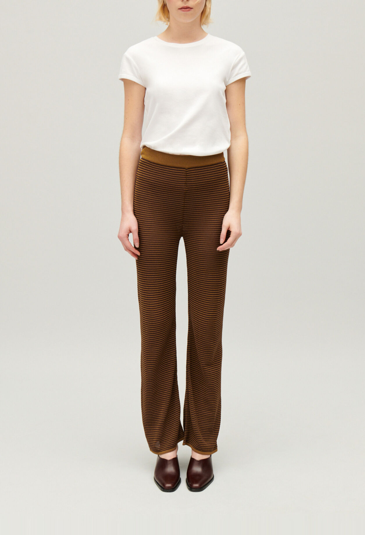 Brown striped trousers