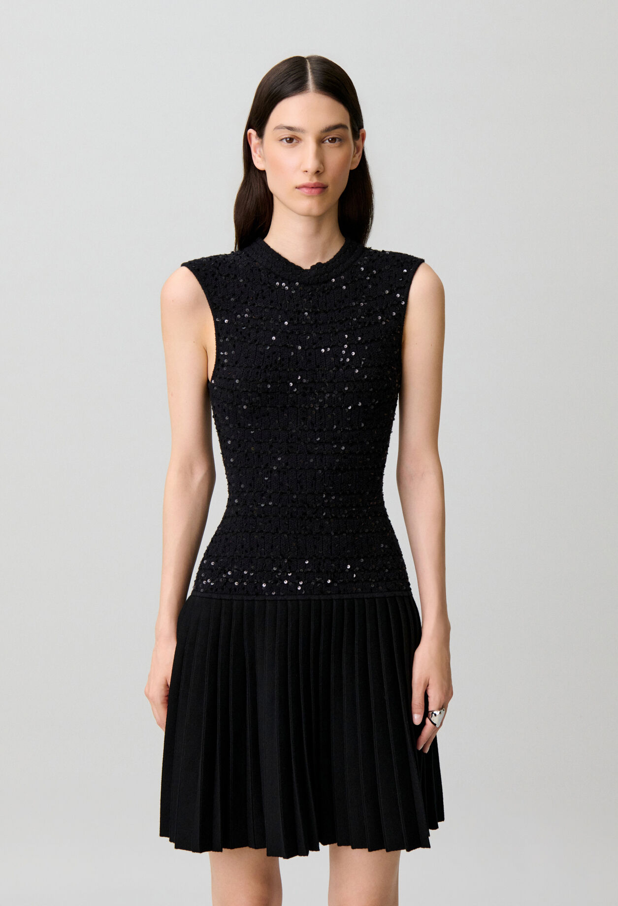Short fitted sequinned knit dress