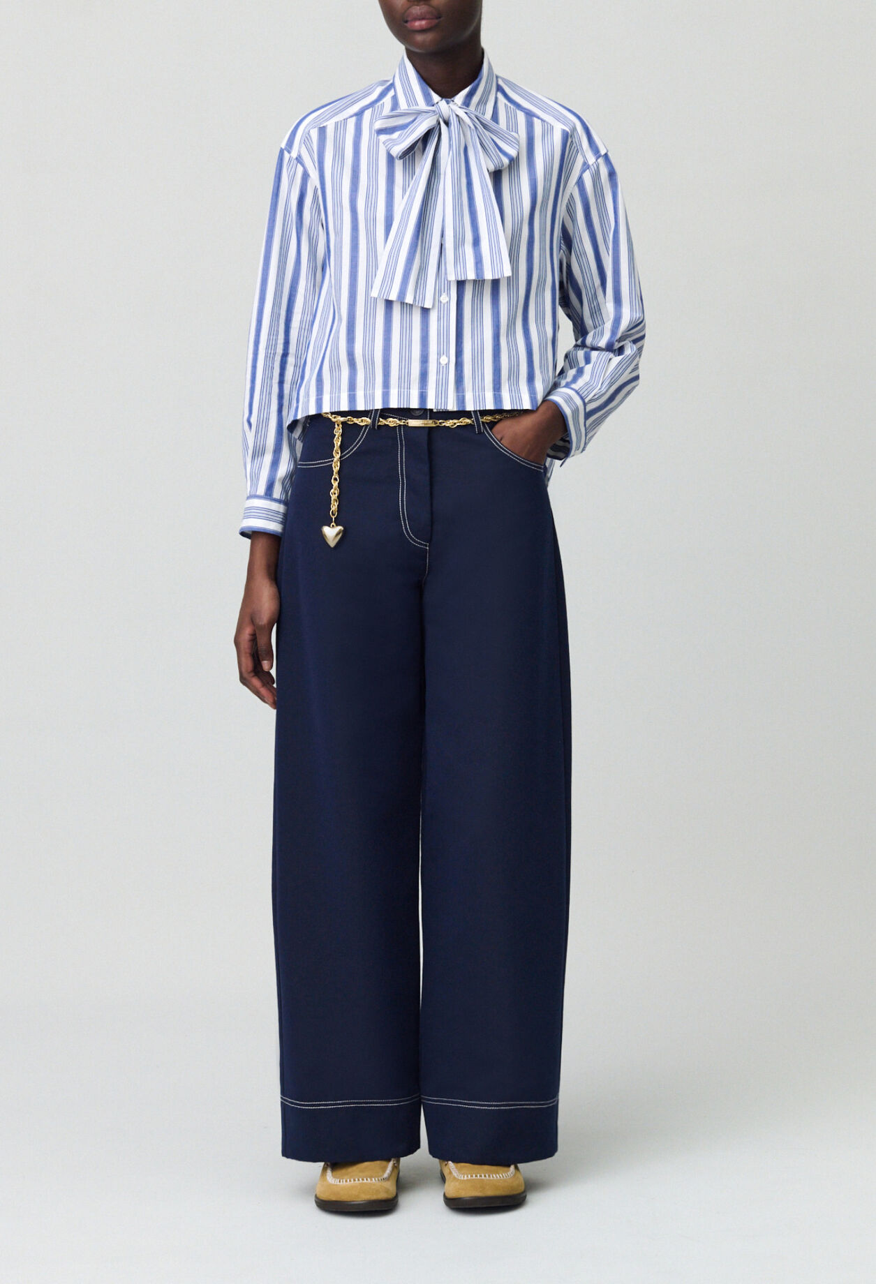 Striped shirt with bow collar