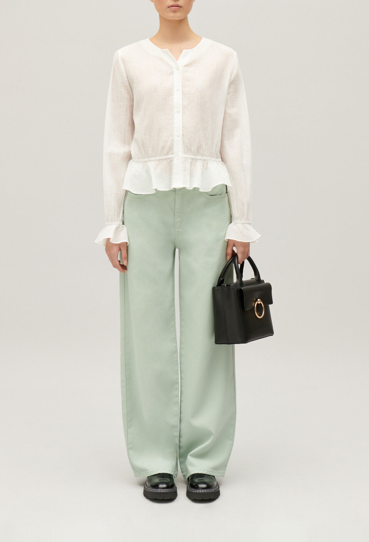 Ruffled cream basque shirt