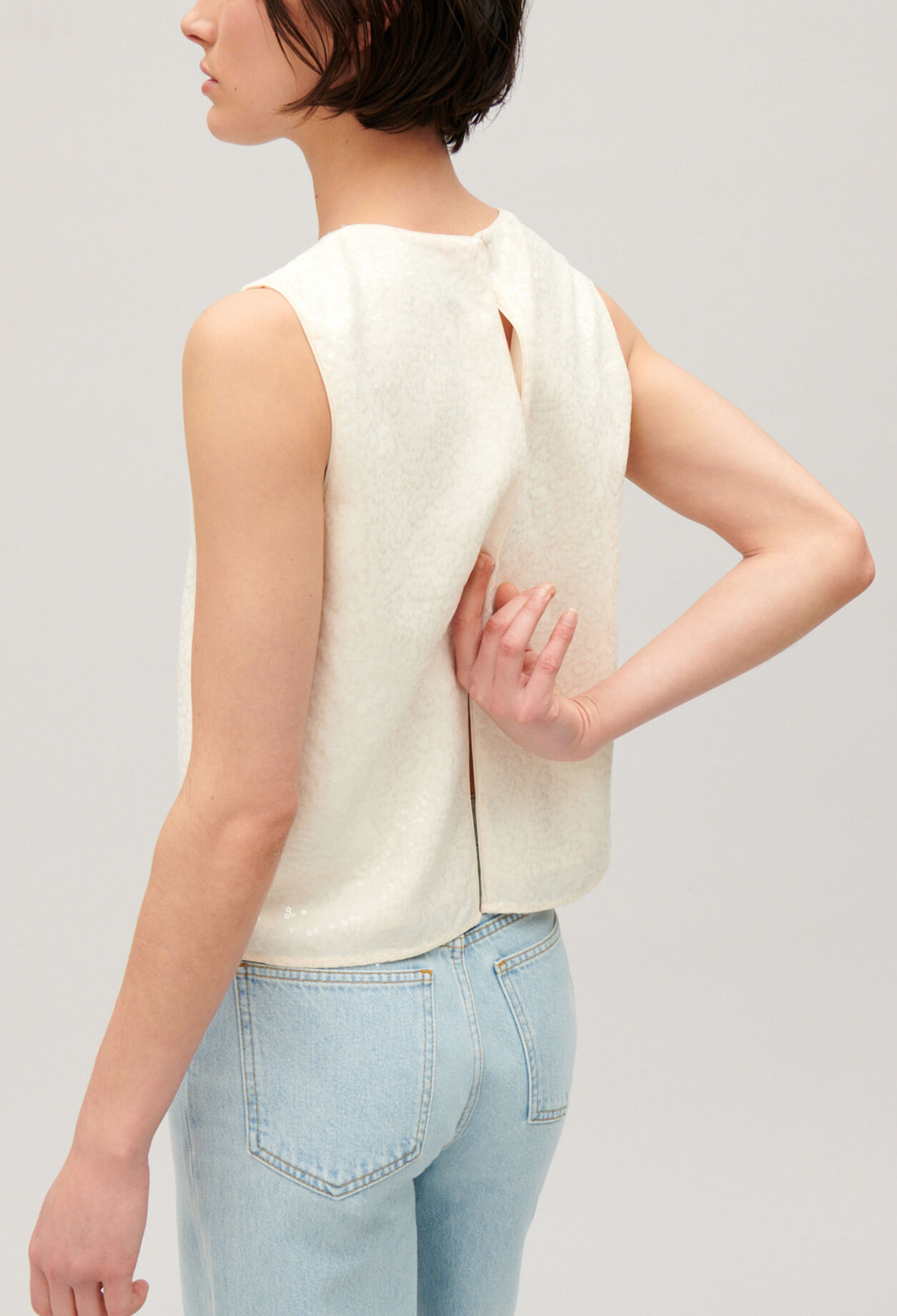 Ecru sequined sleeveless top