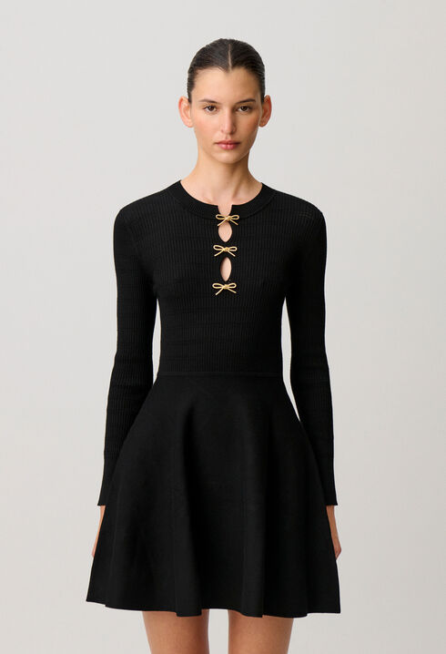 Short knitted dress with knots