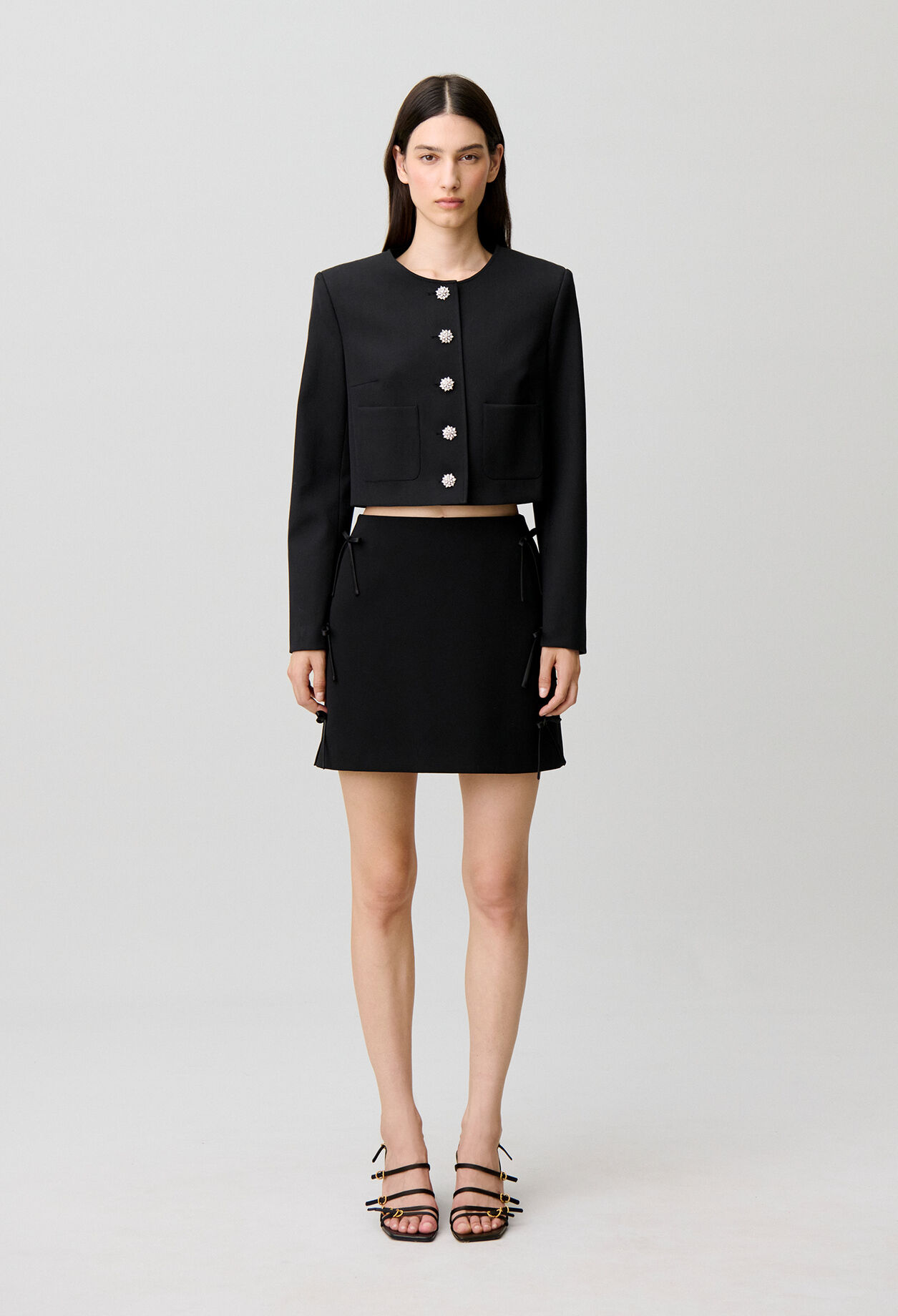 Short jacket with jewel buttons