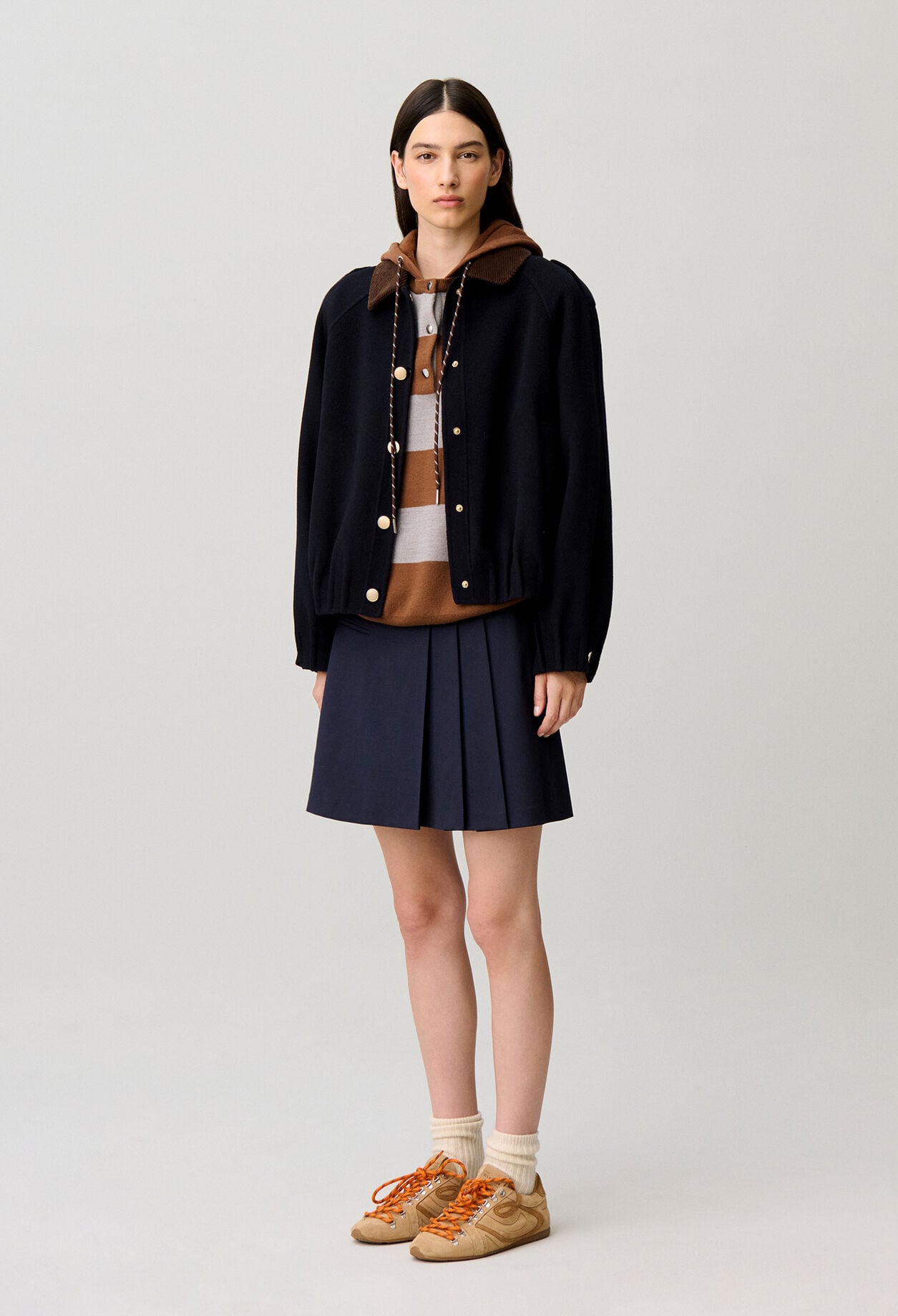 Oversized jacket with gold poppers