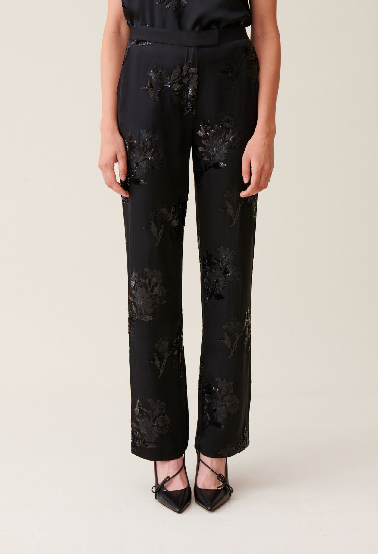 Black sequin-embellished trousers