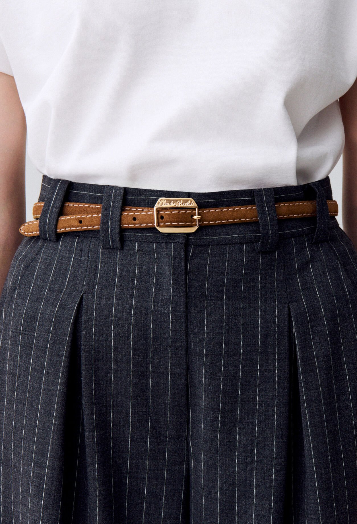 Suede belt with a gold buckle