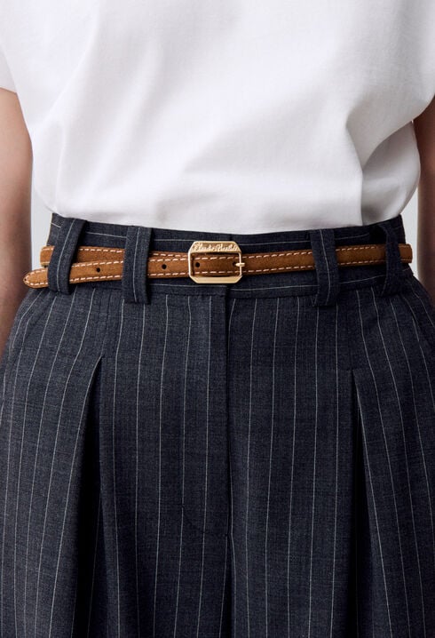 Suede belt with a gold buckle
