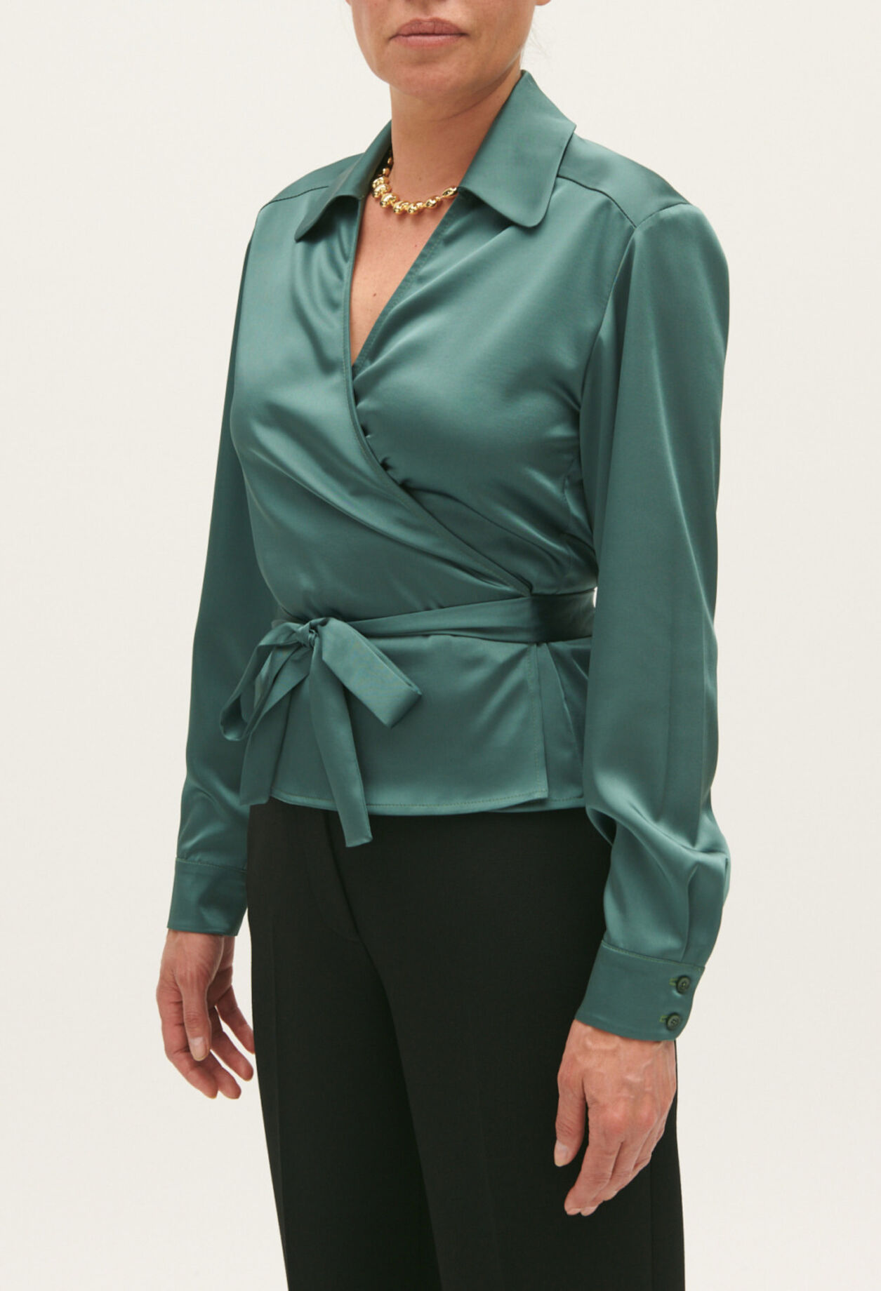 Green wrapover blouse