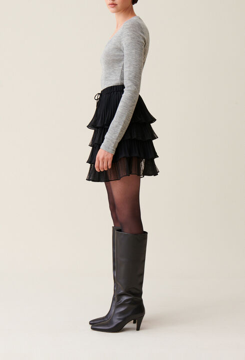 Black short ruffled skirt