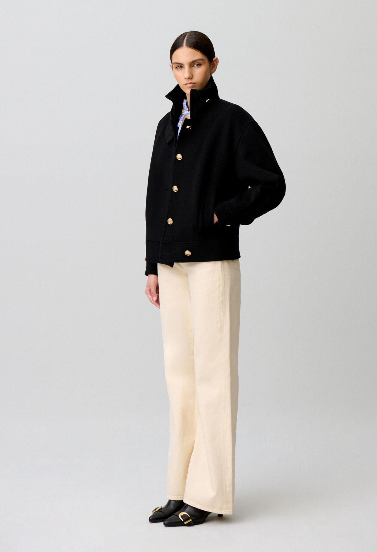 Short gold blouson coat