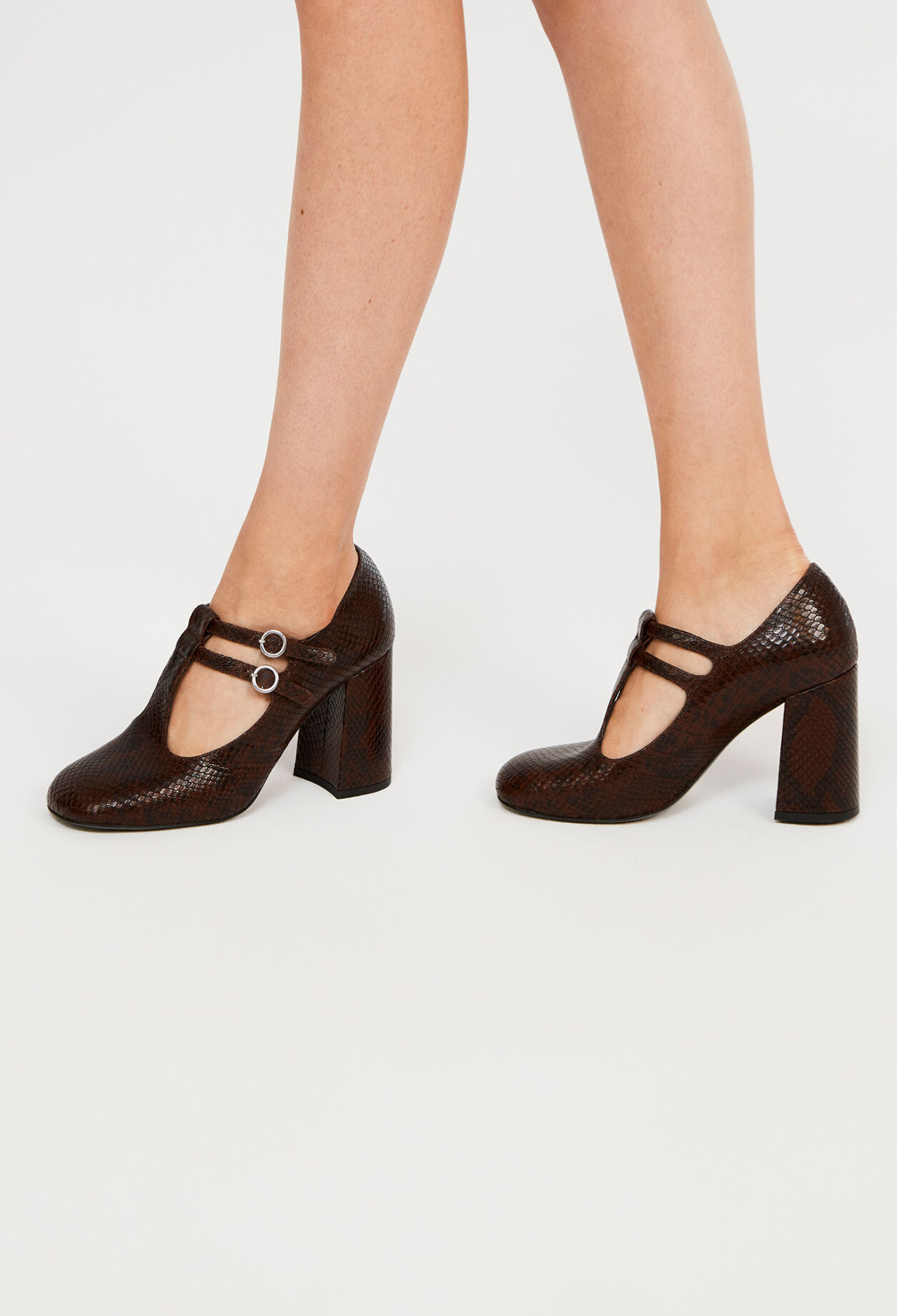 Strappy court shoes