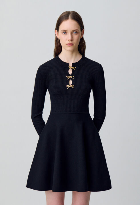 Short knitted dress with knots