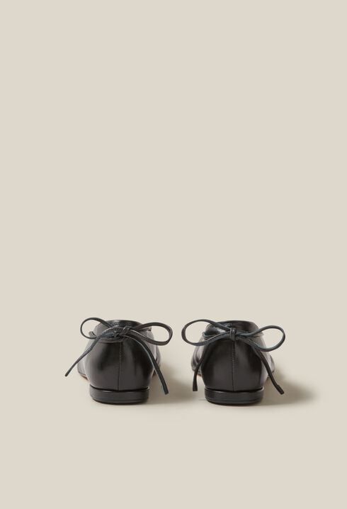 Black leather ballet pumps