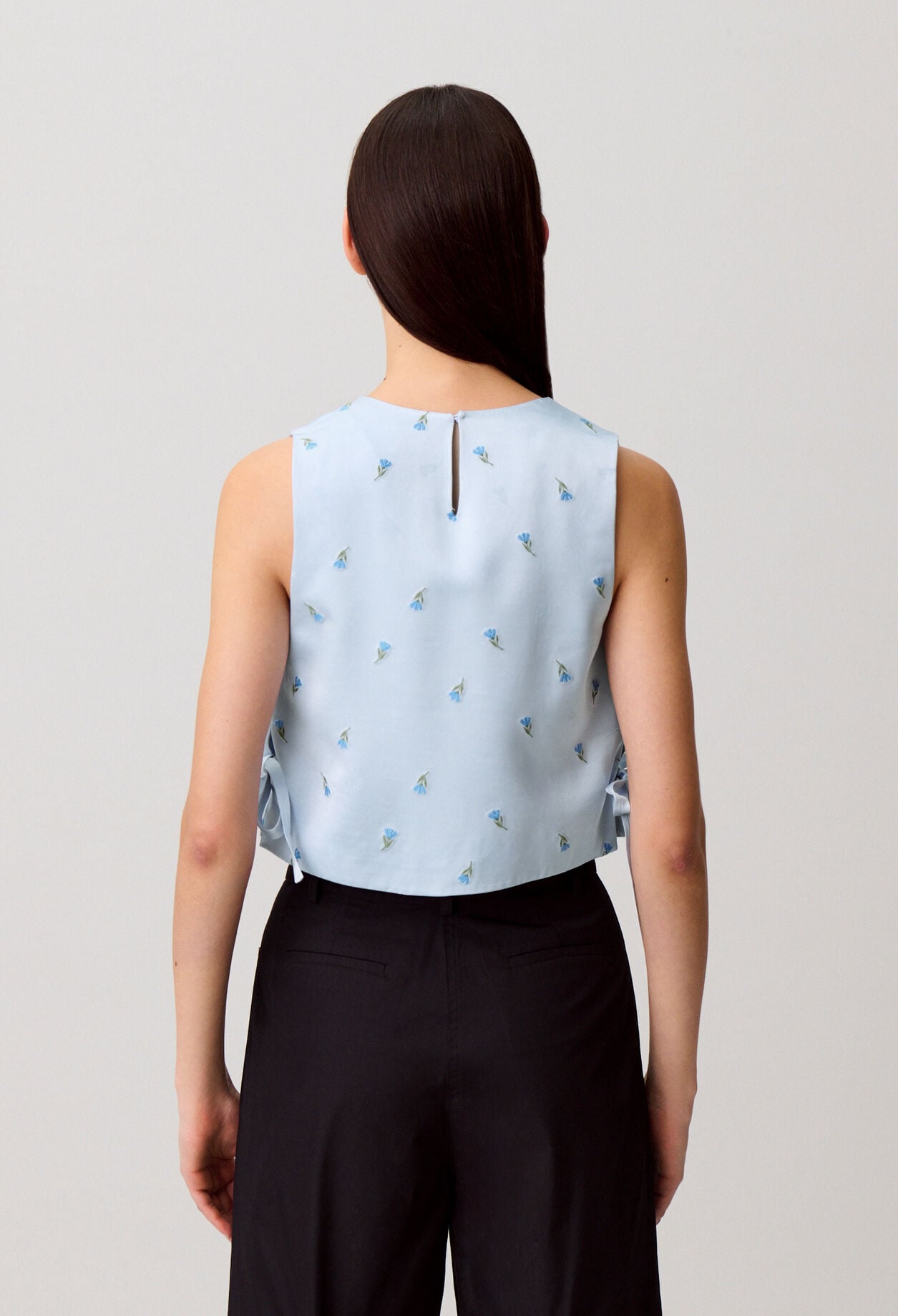 Embroidered satin top