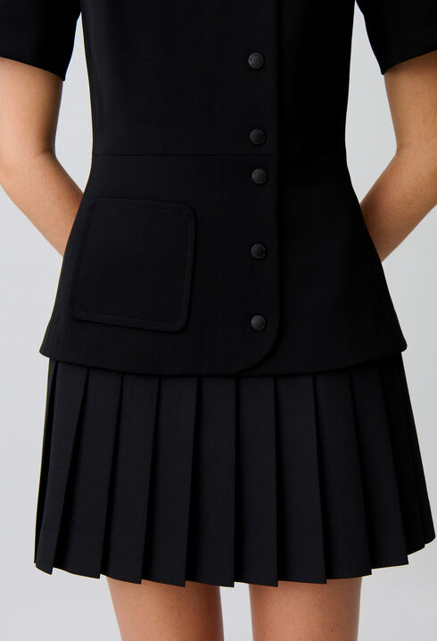 Short pleated peplum dress