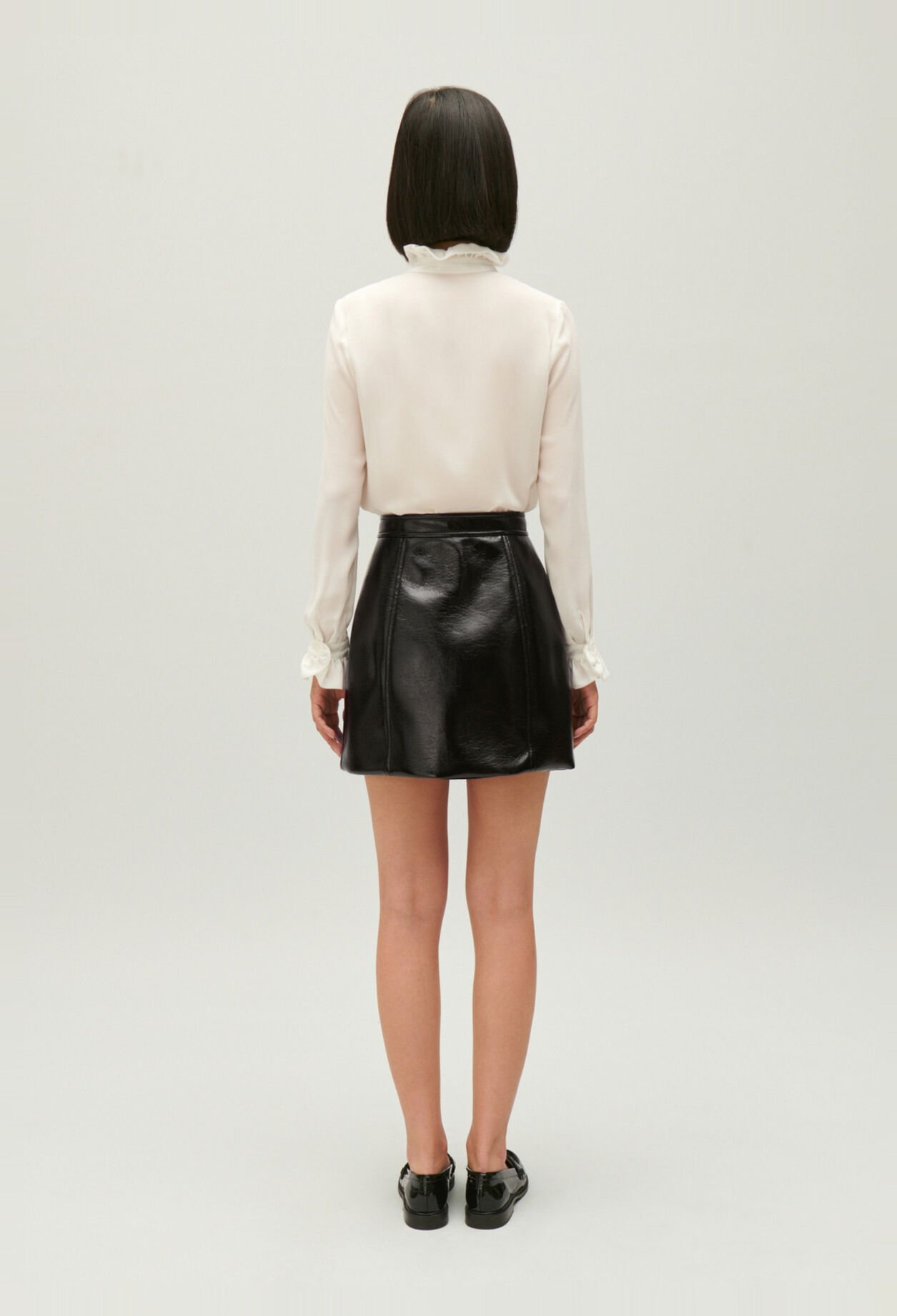 Short black vinyl skirt