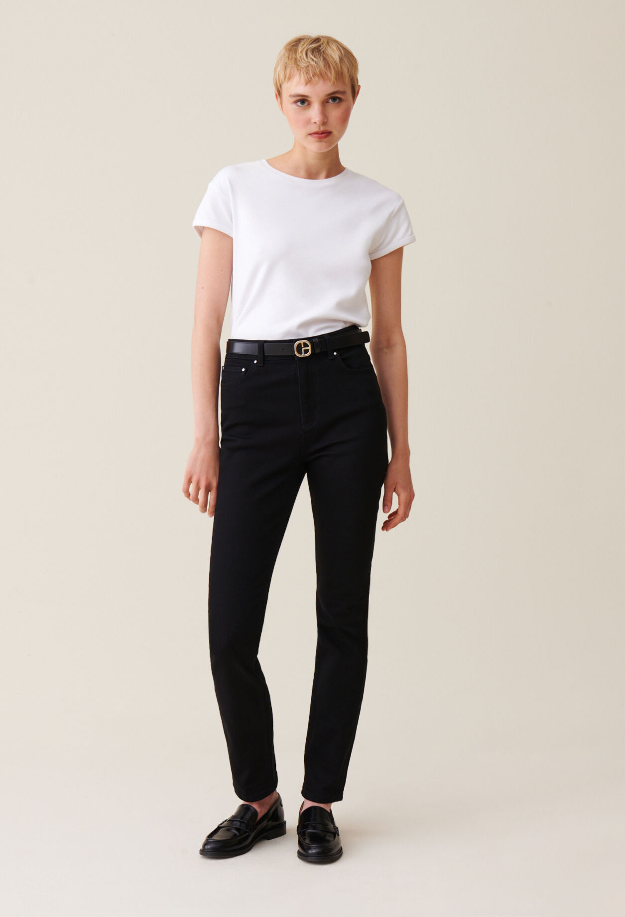 Black mid-rise slim jeans