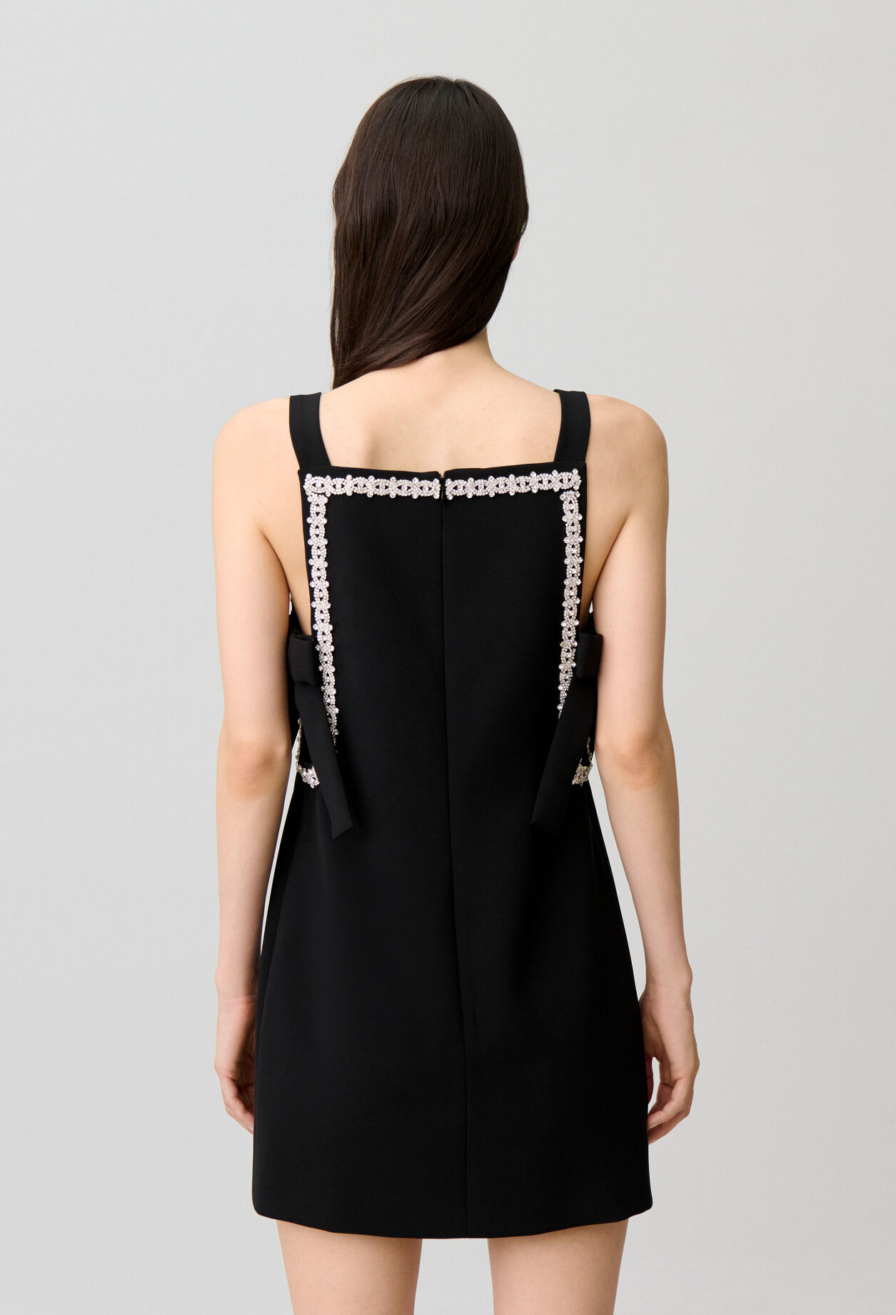 Fitted straight dress with bows