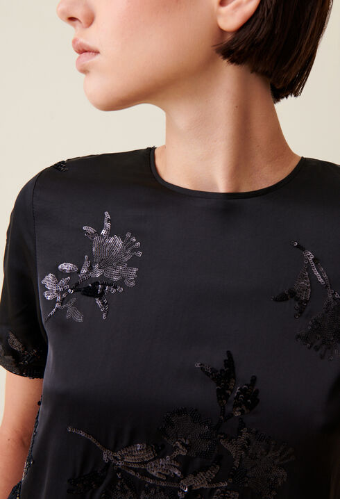 Black top with embroidered sequins