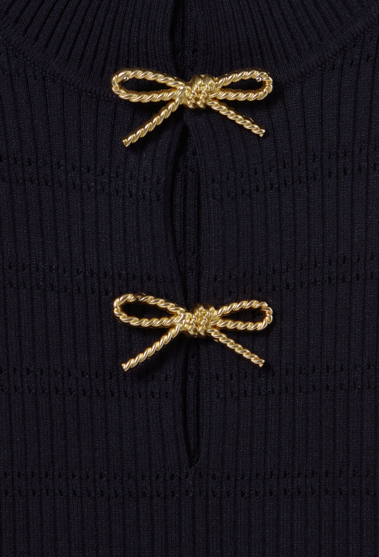 Long knit dress with bows