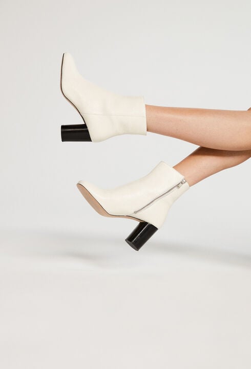 White high heeled ankle boots