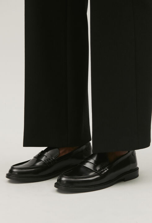 Black leather loafers
