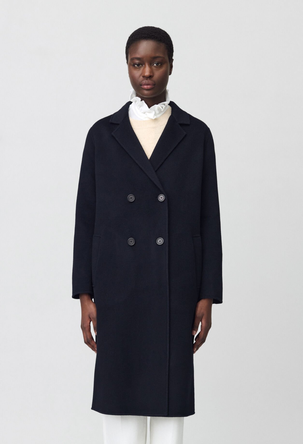 Navy blue mid-length wool coat