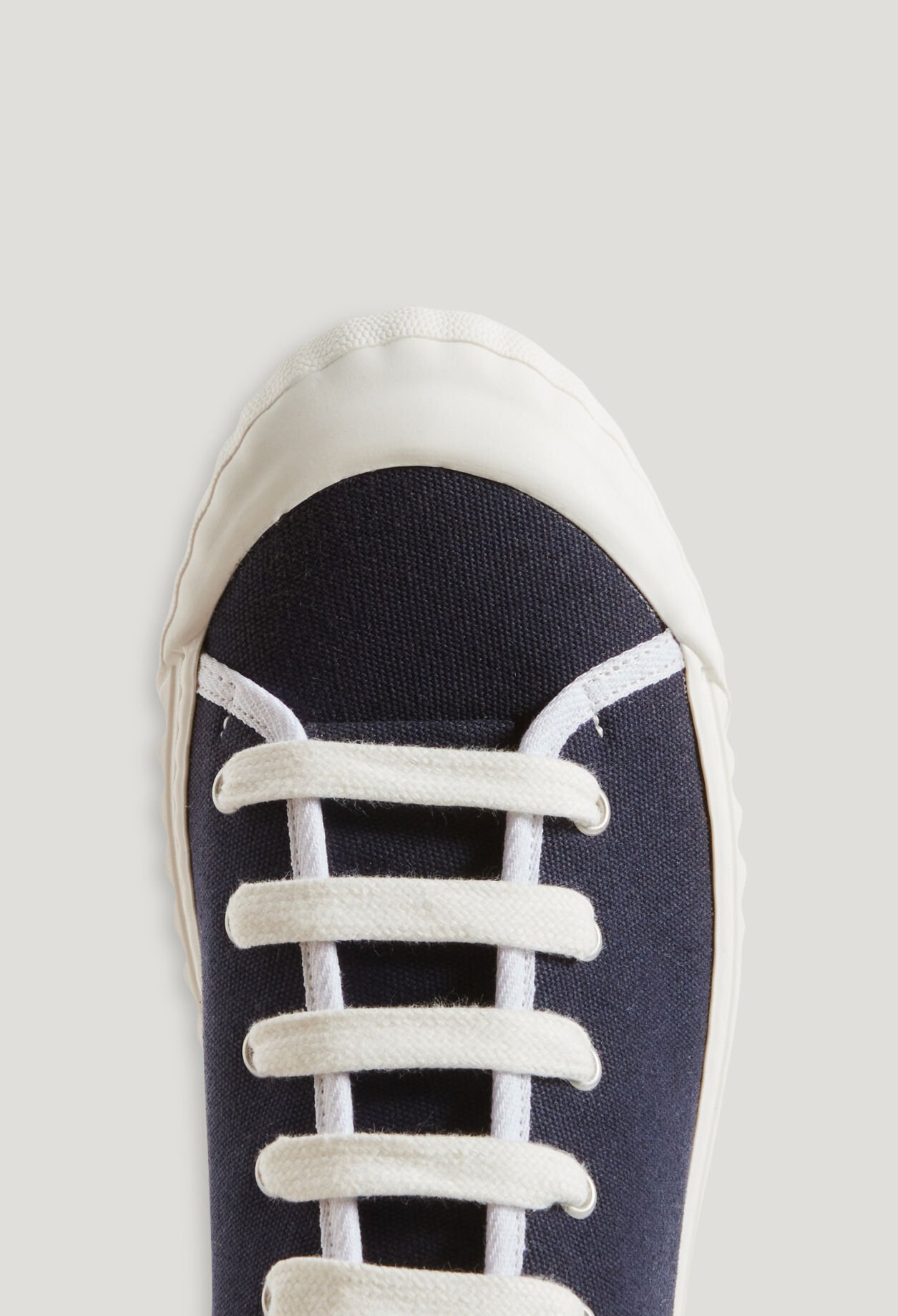 Navy canvas tennis shoes