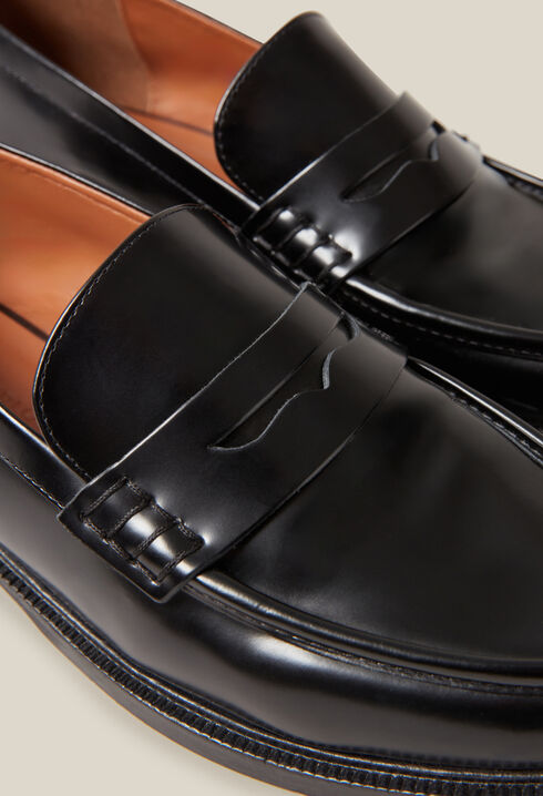 Black leather loafers